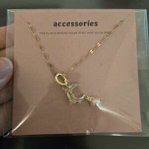 Moon with butterflies and pearl drop necklace